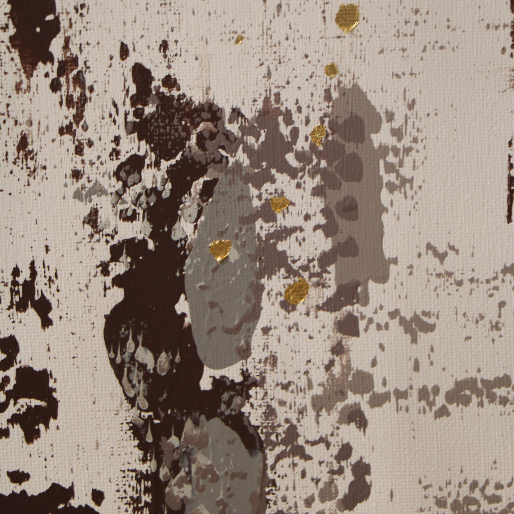 Abstract art with splashes of brown, taupe, and gold on a textured beige background